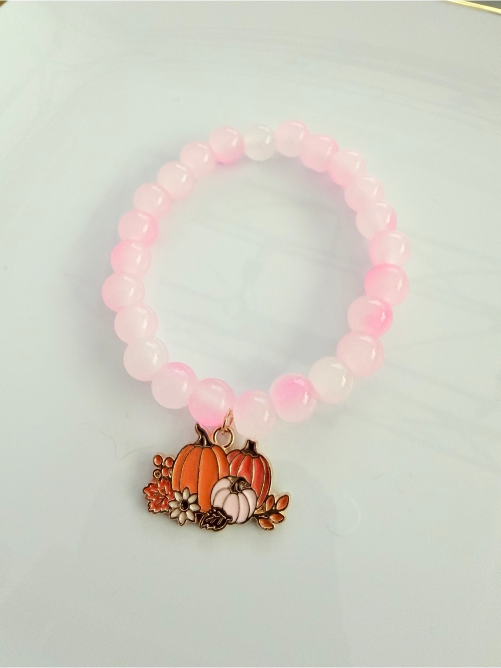 Pink Beaded Stretch Bracelet with Pumpkin Charm
